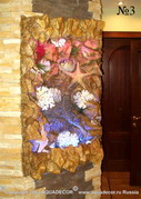 Интерьерная композиция на морскую тему. В декоре использованы кораллы, засушенные морские звезды и чучело рыбы-шара.